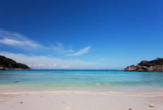 Scenic sand beach under bright blue sky, Similan Islands, Thailand