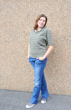 Female tomboy posing outside.