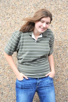 Female tomboy posing outside.