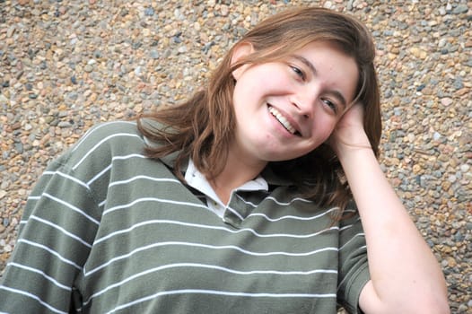 Female tomboy posing outside.