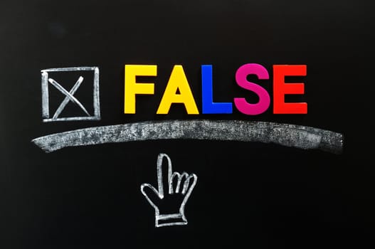 Word of FALSE made of colorful letters with a cross and hand cursor