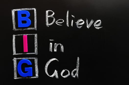 Acronym of BIG on a blackboard - Believe in God 