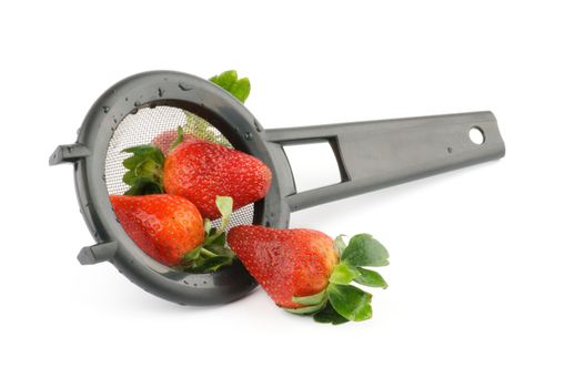 Colander with strawberry isolated on white background