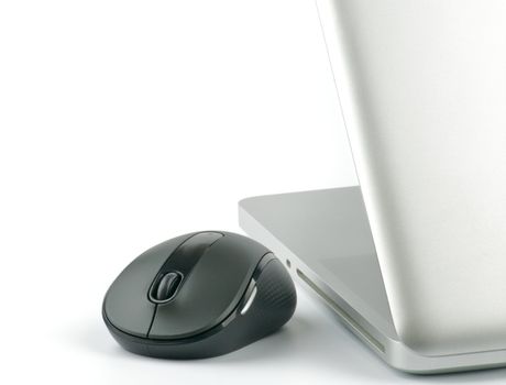 Steel laptop and black computer mouse isolated on white background