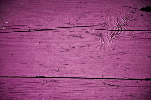 Magenta grungy texture of an old Turkish door