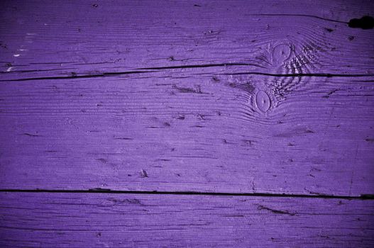 Purple grungy texture of an old Turkish door