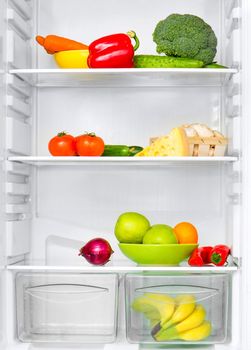 open fridge with fresh vegetables