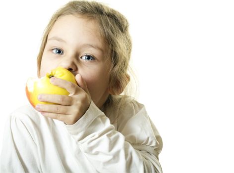 little girl with blue eyes eating an apple