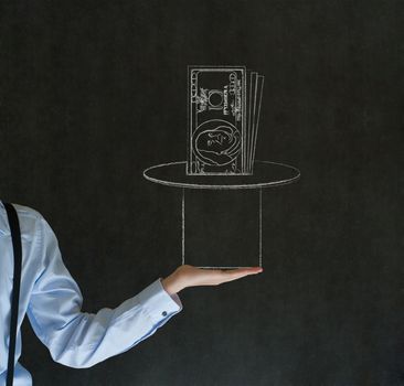 Business man, student or teacher pulling money from a magic hat on blackboard background