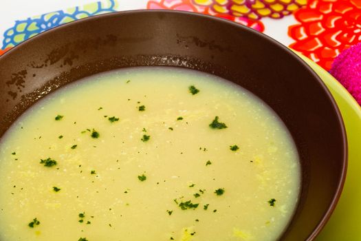 A creamy vegetable soup with parsley