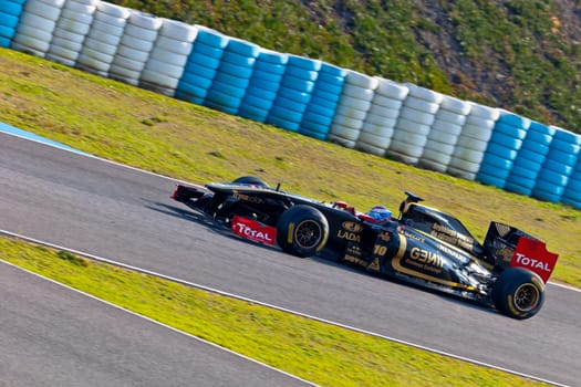 JEREZ DE LA FRONTERA, SPAIN - FEB 11: Vitaly Petrov of Lotus Renault F1 races on training session on February 11 , 2011, in Jerez de la Frontera , Spain