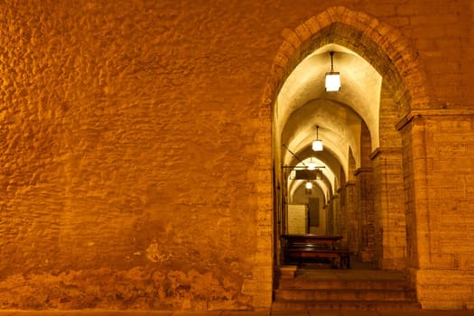 Archway in Tallinn Town Hall at Night in Raekoja Square, Estonia