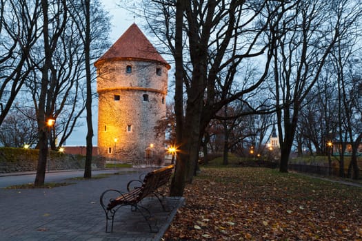 Illuminated Tower in the Old Town of Tallinn , Estonia