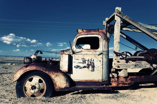 Old truck out in the field 