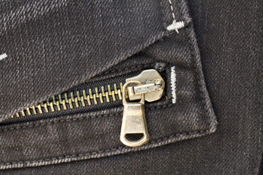 pocket with zipper of fashionable dark gray jeans