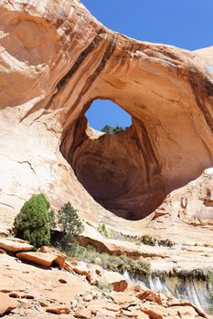 Bowtie Arch, a pothole arch formed when a pothole broke through from the top of the cliff