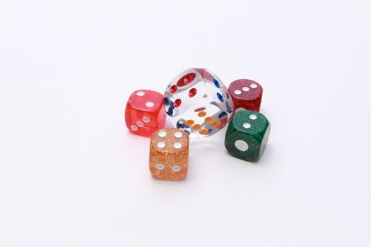 5 coloured dices on white background