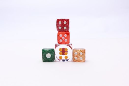 5 coloured dices on white background