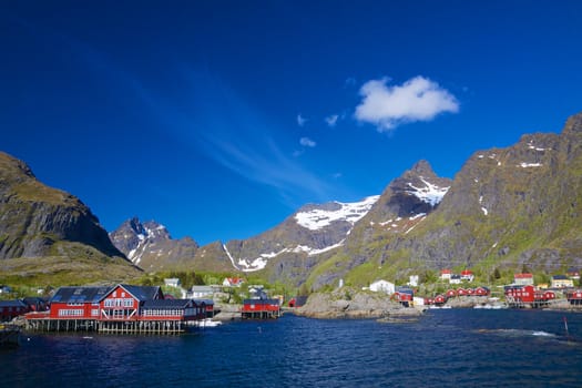 Picturesque village on Lofoten islands in Norway surrounded by scenic mountains