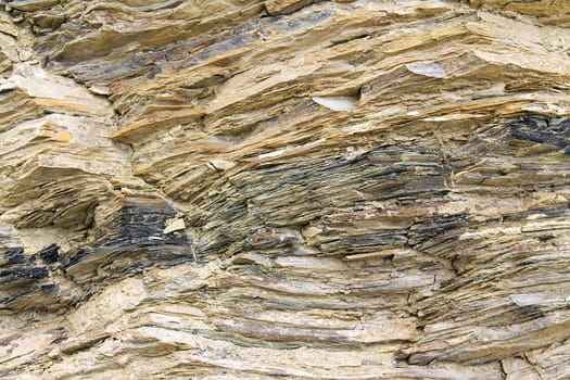 stone rock with cracks in the background