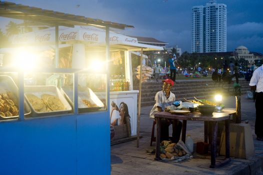 Colombo,Sri Lanka - February 22,2011: Traditional fast food on the quay of Colombo