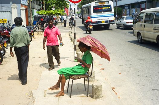 Colombo, Sri Lanka - Feb 25, 2011: Street of Colombo. Colombo is the largest city and former capital of Sri Lanka with population about 1 million people.