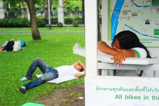 Bangkok, Thailand - March 25, 2011: People sleeping  in Bangkok. Bangkok is the capital city of and largest urban area in Thailand with population about 12 million people