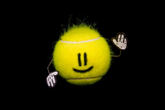 Happy yellow tennis ball welcoming somebody and smiles