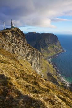 Scenic coastal cliffs on island of Vaeroy, Lofoten islands in Norway