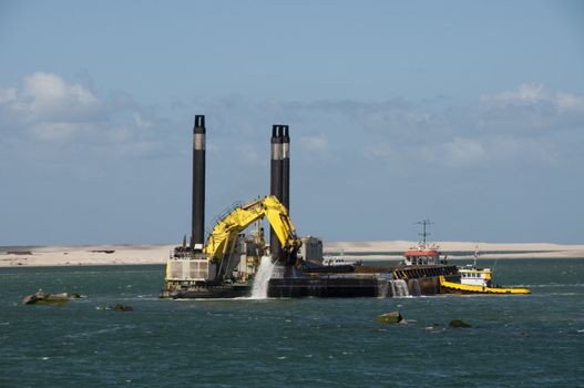 dredger for winning new land near the Dutch coast for heavy industry