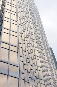 glass wall of a high-rise building in downtown Toronto