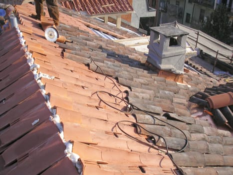 Working on a roof at a building site