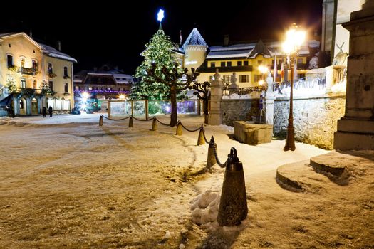 Illuminated Christmas Tree on Central Square of Megeve in French Alps