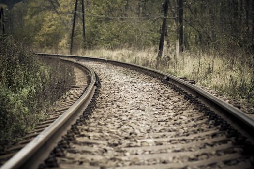 retro train railroad disappearing in the distance