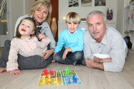 Family playing board game