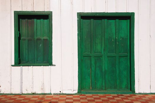 Old wooden door and window in a house in Nicaragua.