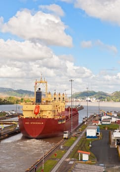 Cargo vessel crosses the Panama Canal at Miraflores locks, in the pacific side.