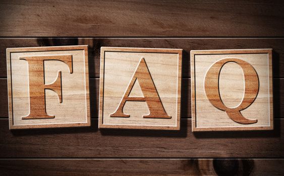FAQs 3D Text with wooden background.