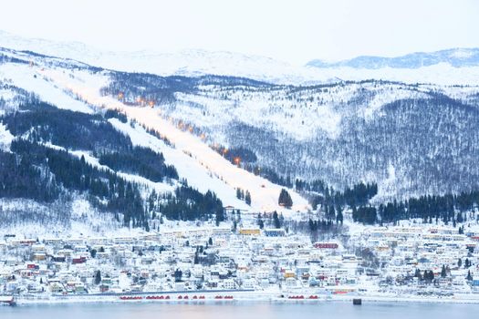 Narvik Cityscape with Skiing course dwon hill from mountain Lapland Norway 