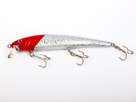 red and white fishing lure ready for the big fish