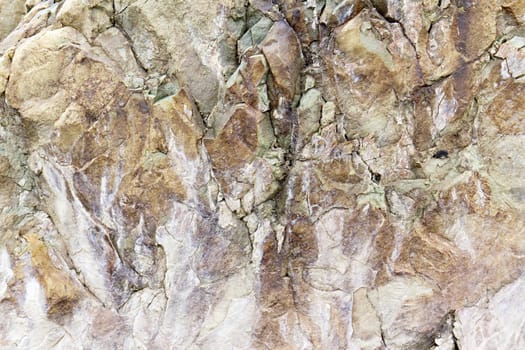 stone rock with cracks in the background