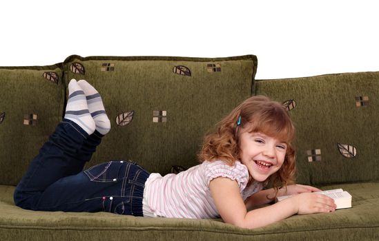 happy little girl reading a book