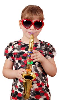 little girl playing music on saxophone