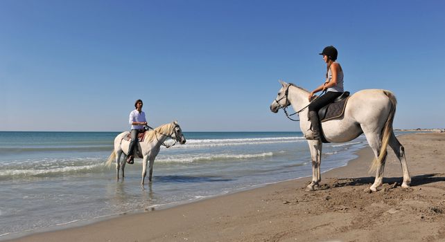 a father and his daughter with their horses in holidays