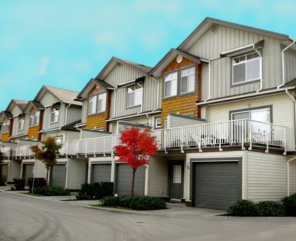 row of townhouse condominium. real estate investment property of house and garage.
