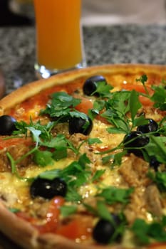 Macro shot of a hot pizza with shallow depth of field