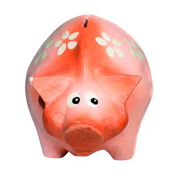 Ruddy piggy bank made of clay isolated on white background