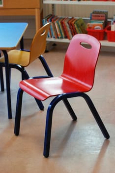 Small chairs in strong bright colors