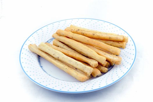 Breadsticks on white background.