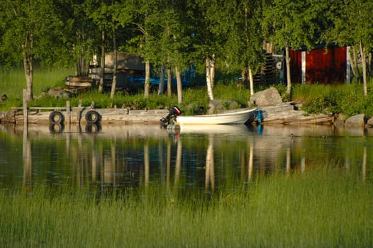 A boat at a bridge